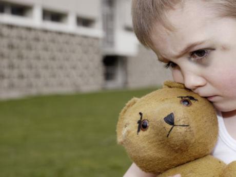 abused child with teddy bear