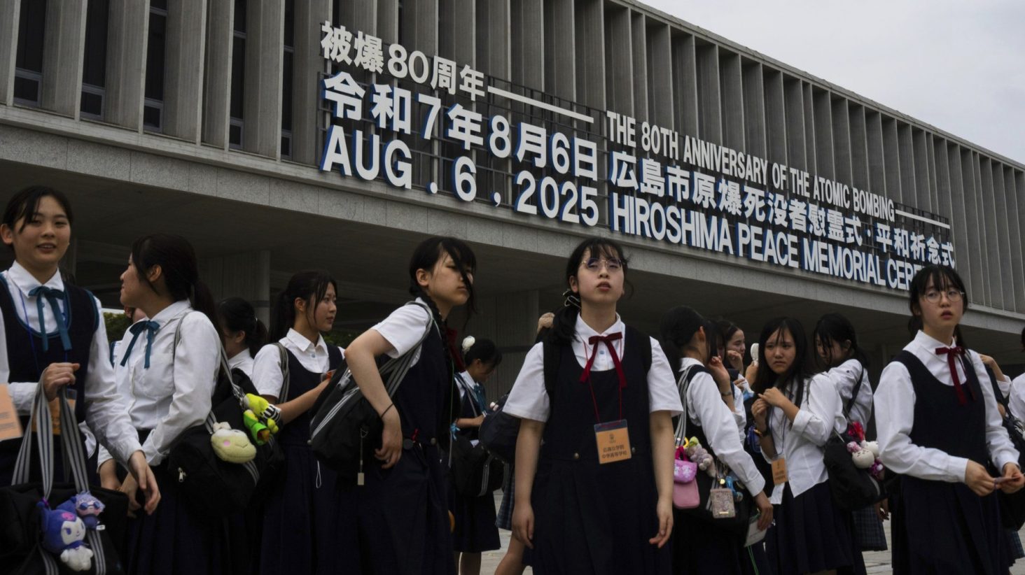 Students walk outside the Peace Memorial Park in Hiroshima, Monday, August 4, 2025, as Japan will mark 80th anniversary of the WWII U.S. atomic bombing on August 6.